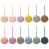 A set of nine food-grade silicone pacifier cases in various pastel and neutral colors.