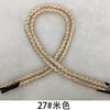 A bundle of beige multi-color polypropylene gift string rope tied in an 'X' shape.