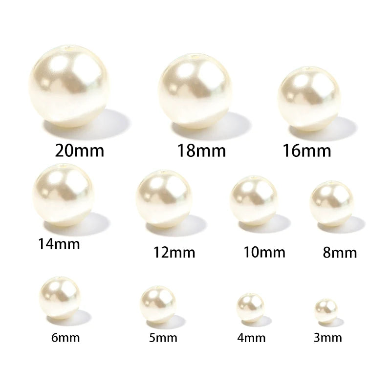 A set of round ABS imitation pearl beads shown in various sizes ranging from 6mm to 20mm.