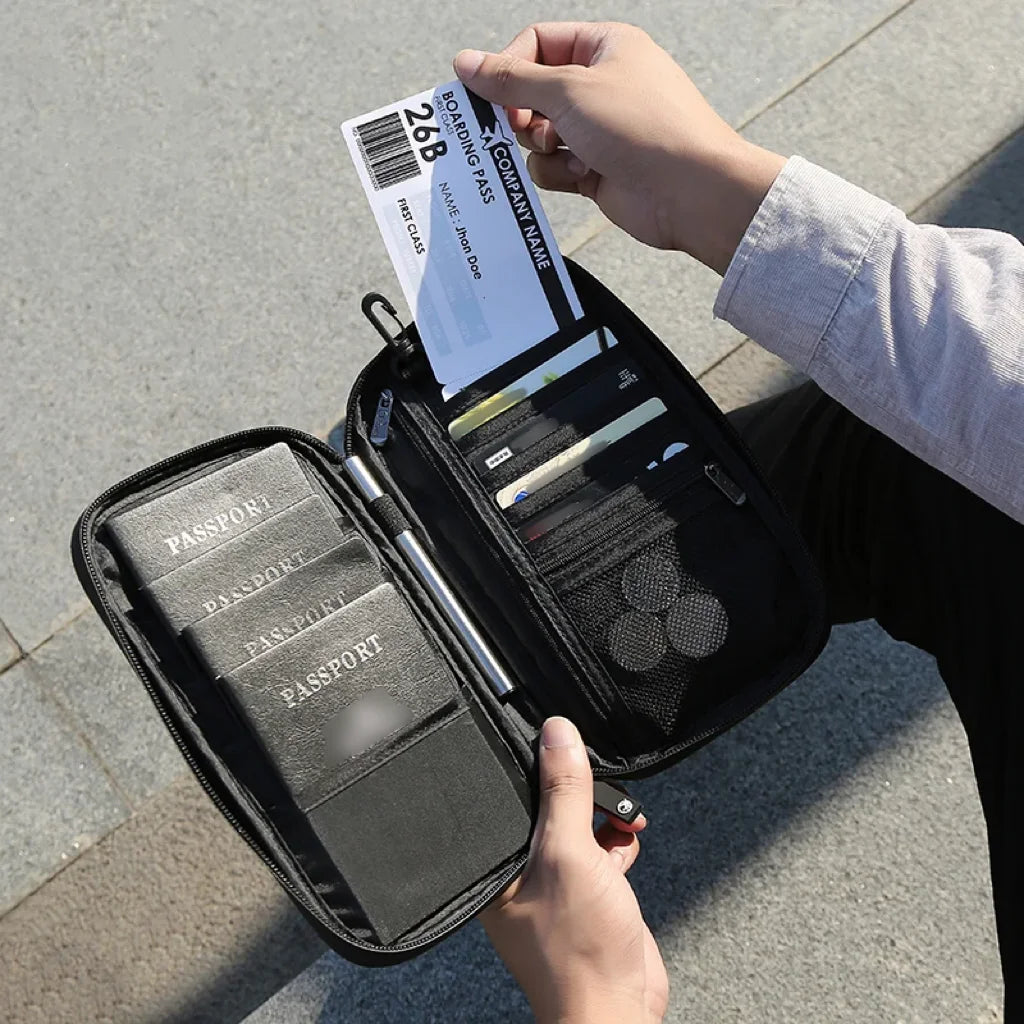 A hand is holding an open black passport holder with a boarding pass and passport visible.
