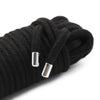 Black braided rope with silver metal ends used for Shibari bondage