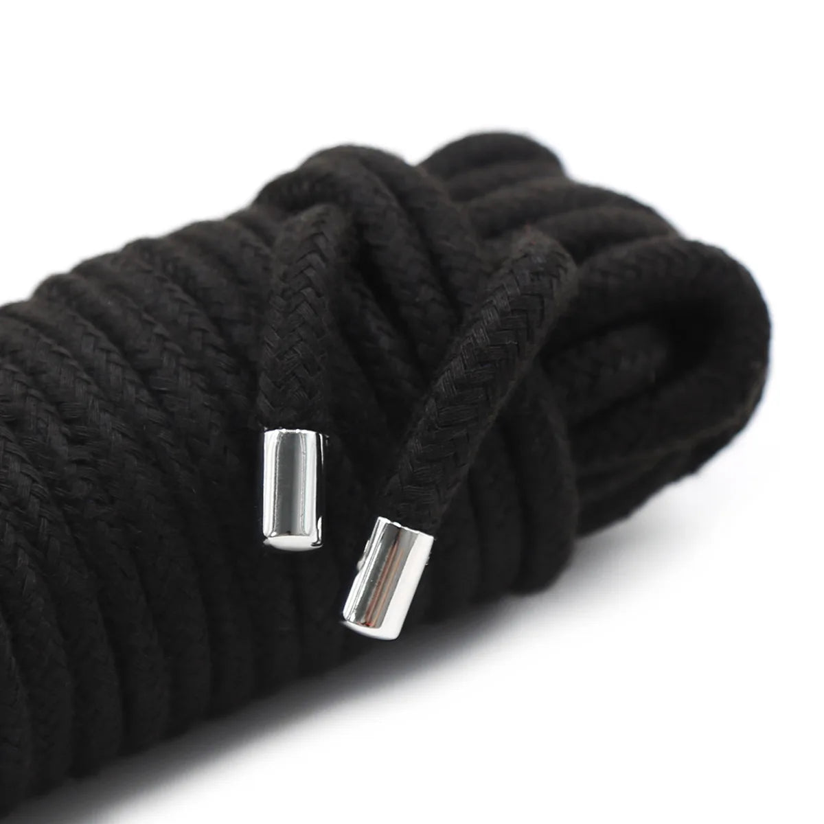 Black braided rope with silver metal ends used for Shibari bondage