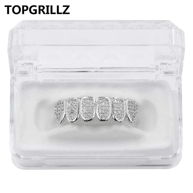 مجموعة أسنان ذهبية صلبة (Grillz)