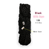 Black silk rope with a metal cover coiled and tied for bondage play