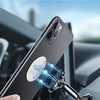 A smartphone is magnetically attached to a car interior surface, demonstrating strong magnetic attraction.
