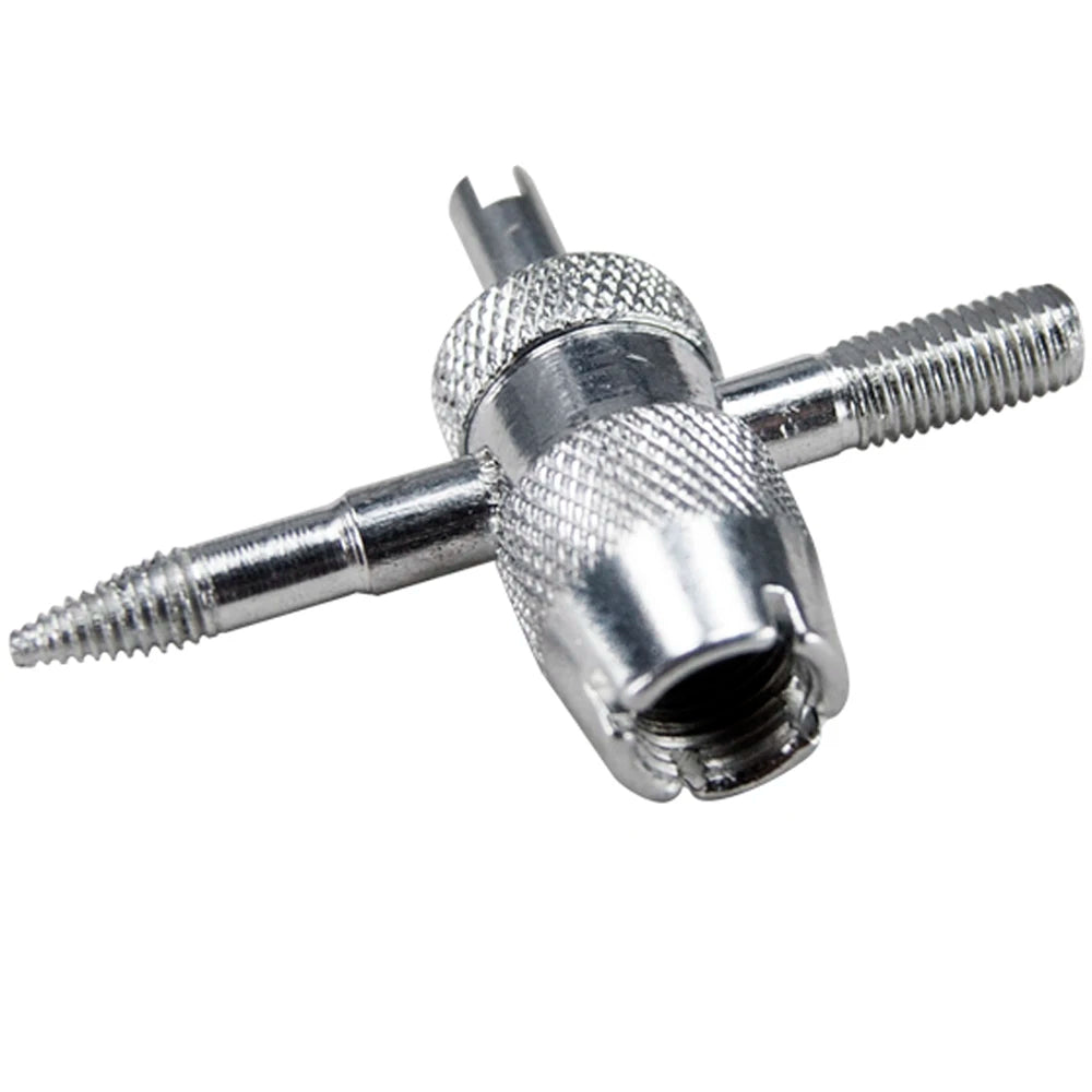 Kit de réparation de valve de pneu argenté à 4 voies avec embouts filetés et raccord spécialisé.