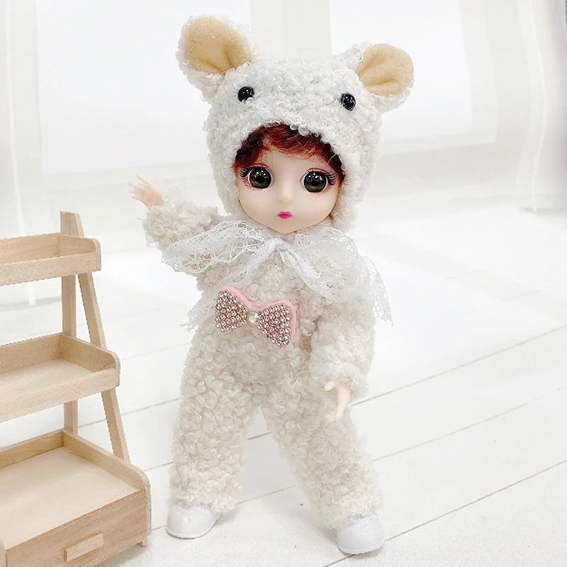 A fluffy white animal-eared fashion doll wearing a matching outfit and bow