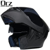 A black modular flip-up motorcycle helmet shown from the side.