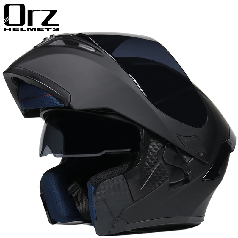 A black modular flip-up motorcycle helmet shown from the side.