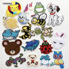 A collection of embroidered animal patches featuring various animals like cats, frogs, bees, and rabbits.