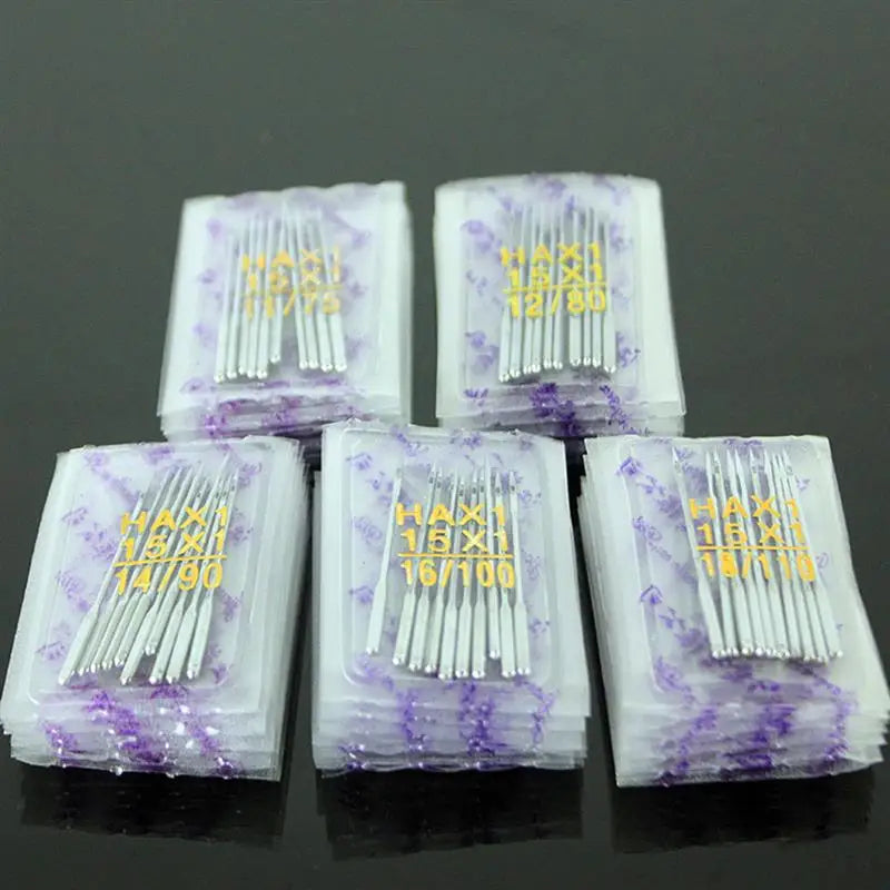 A multi-pack of universal household sewing machine needles in clear plastic packaging with purple tips.