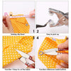 A set of tools for sewing and fabric work including a sewing clip, pliers, and scissors used to fix and remove metal buttons.
