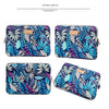 A set of four durable canvas laptop sleeves featuring a vibrant blue and purple tropical leaf pattern.