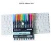 A set of 12 glitter pens in various colors including neon and pastel shades displayed next to a laptop keyboard