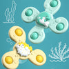 A collection of soft, pastel-colored suction cup spinner bath toys featuring sea creatures like a fish and a crab.