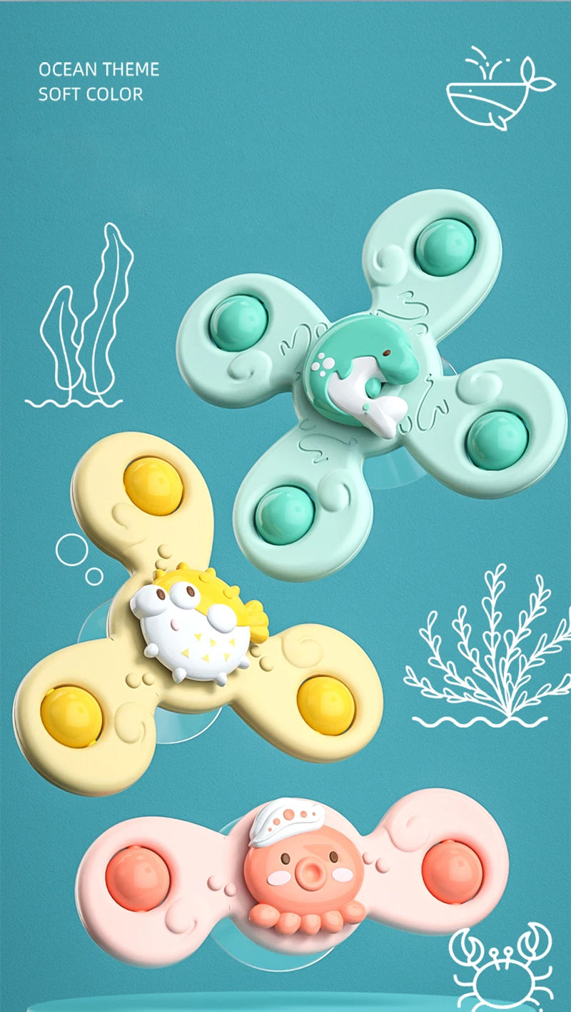 A collection of soft, pastel-colored suction cup spinner bath toys featuring sea creatures like a fish and a crab.