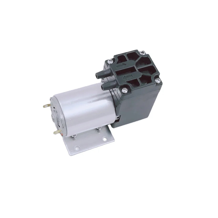 Bomba de aire diafragma compacta de 12V DC con motor plateado y carcasa gris.