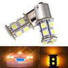A close-up view of an SMD LED bulb designed for turn signal and reverse lights, shown next to a vehicle headlight.