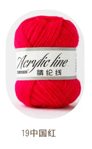 A ball of bright magenta acrylic yarn labeled Acrylic line in the color China Red.