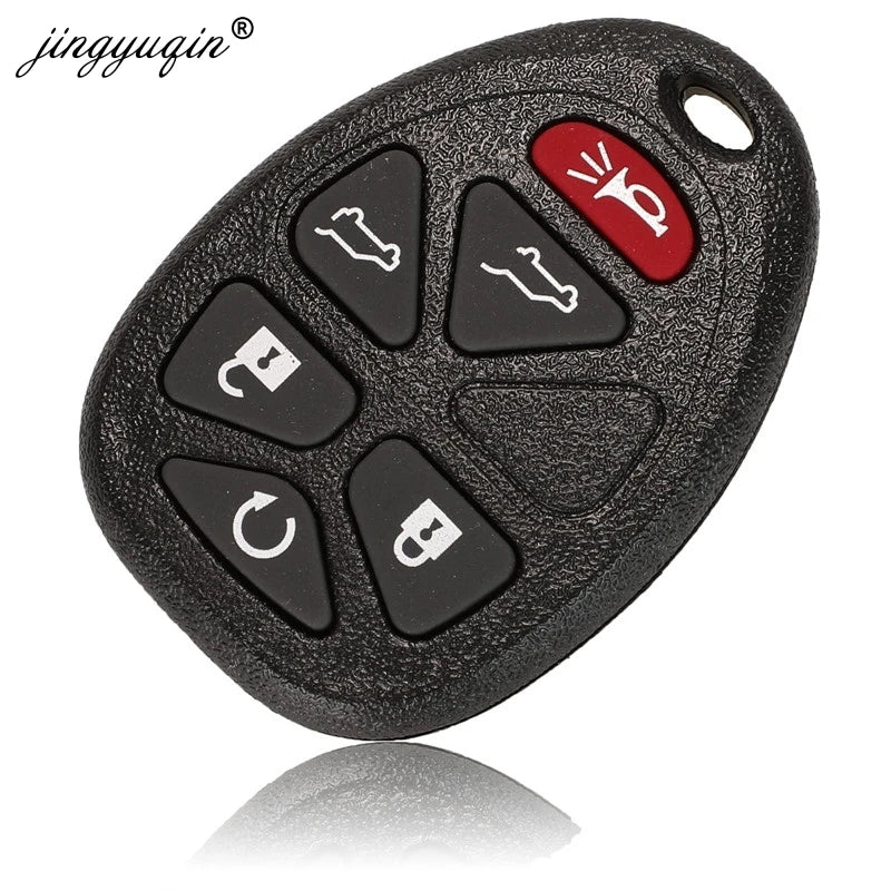A black replacement car key fob with a blank key for Select GM vehicles.