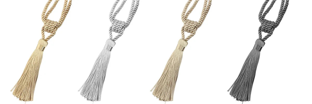 A set of four elegant tassel curtain tiebacks in beige, silver, gold, and gray tones.