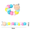 A colorful wooden puzzle featuring a smiling face made of round, brightly colored wooden pieces.
