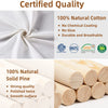 A close-up of natural cotton fabric and solid pine wood showing certified quality features.