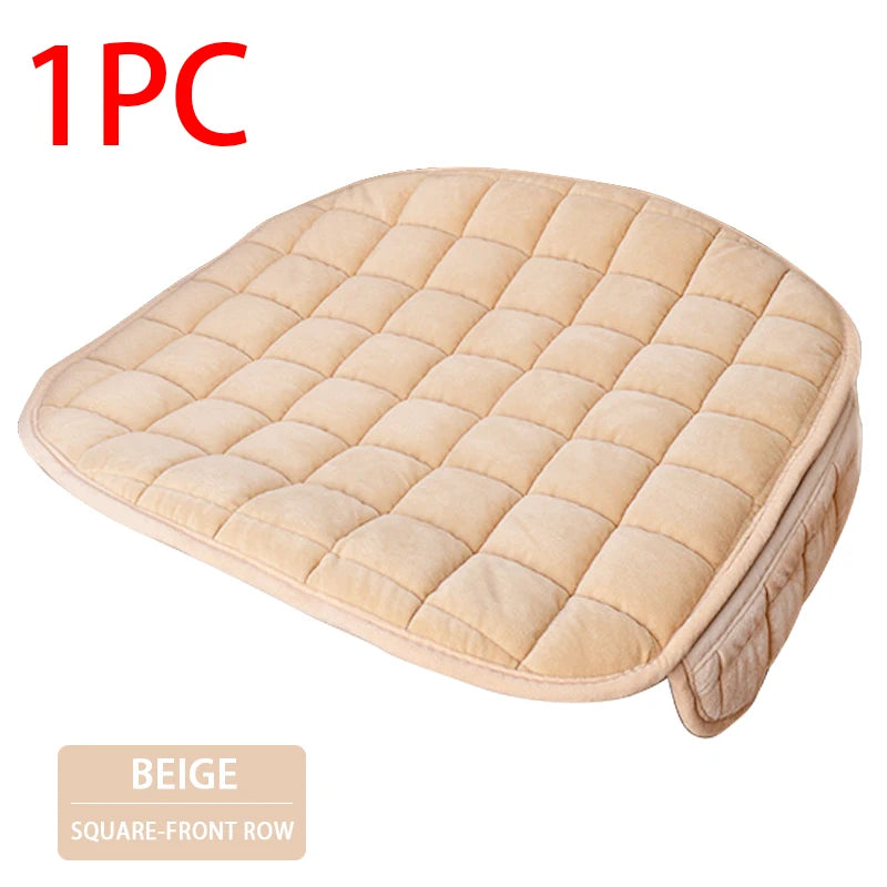 One beige quilted car seat cover with a square-front row design.