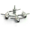 Un jeu de quatre outils métalliques pour réparer les valves de pneus, de différentes tailles et pointes.