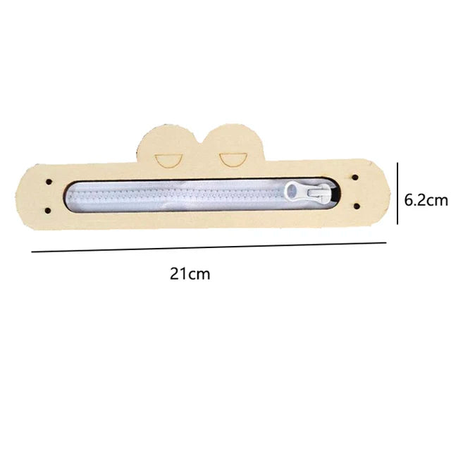 A wooden busy board with a clear plastic strip and a metal clip, measuring 21cm long and 6.2cm high.