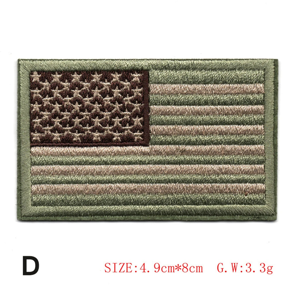 Embroidered American flag patch featuring the stars and stripes design in olive green and brown threads.