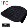 A black quilted car seat cover with a square-front row design.