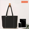 A black A4 sized canvas tote bag with a wooden hanger displayed on a white background.
