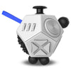 A white 12-sided fidget cube with a black top and a blue stick, shown from the front.