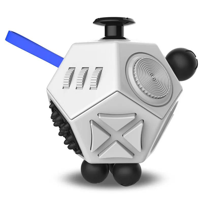 A white 12-sided fidget cube with a black top and a blue stick, shown from the front.