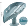 A light blue leaf-shaped suction cup soap dish with a self-draining tray and a stand.