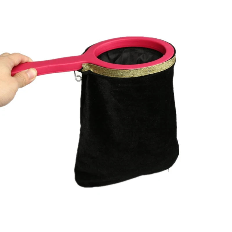 A pink and gold magic trick prop set featuring a bag for magic and a flower.