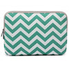 A teal and white chevron patterned canvas laptop sleeve for a MacBook.