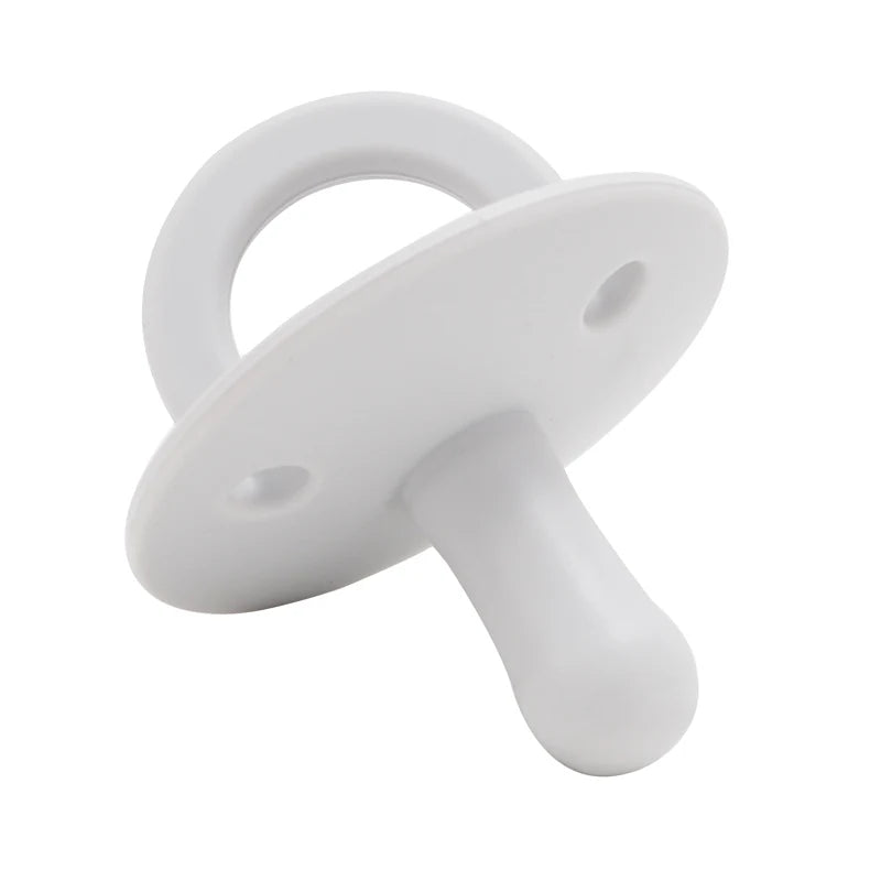 A white silicone baby pacifier soother with a ring and a handle.