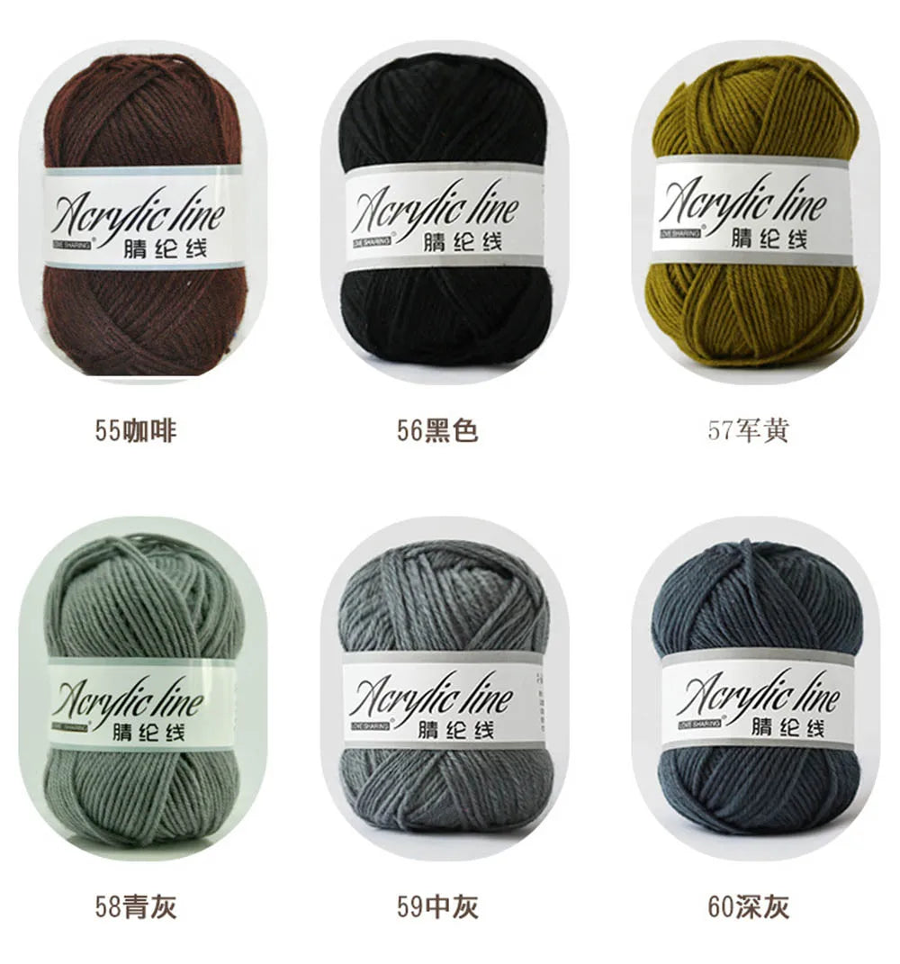 A collection of soft acrylic yarn balls in various colors and thicknesses, including brown, black, olive green, gray, and nav