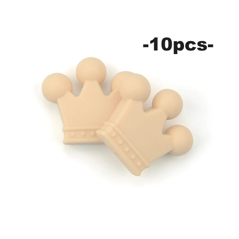 Ten food-grade silicone crown beads for jewelry making and DIY crafts displayed on a white background.