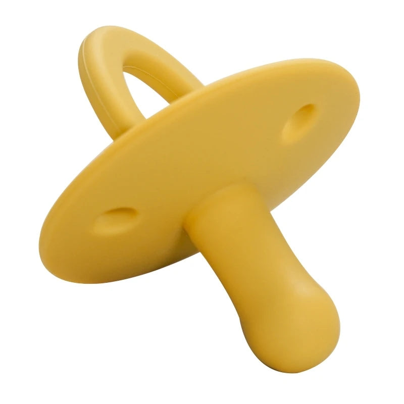 A yellow silicone baby pacifier soother with a curved handle and a rounded body.