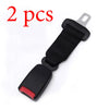 Two black seat belt extenders with metal buckles shown against a white background.