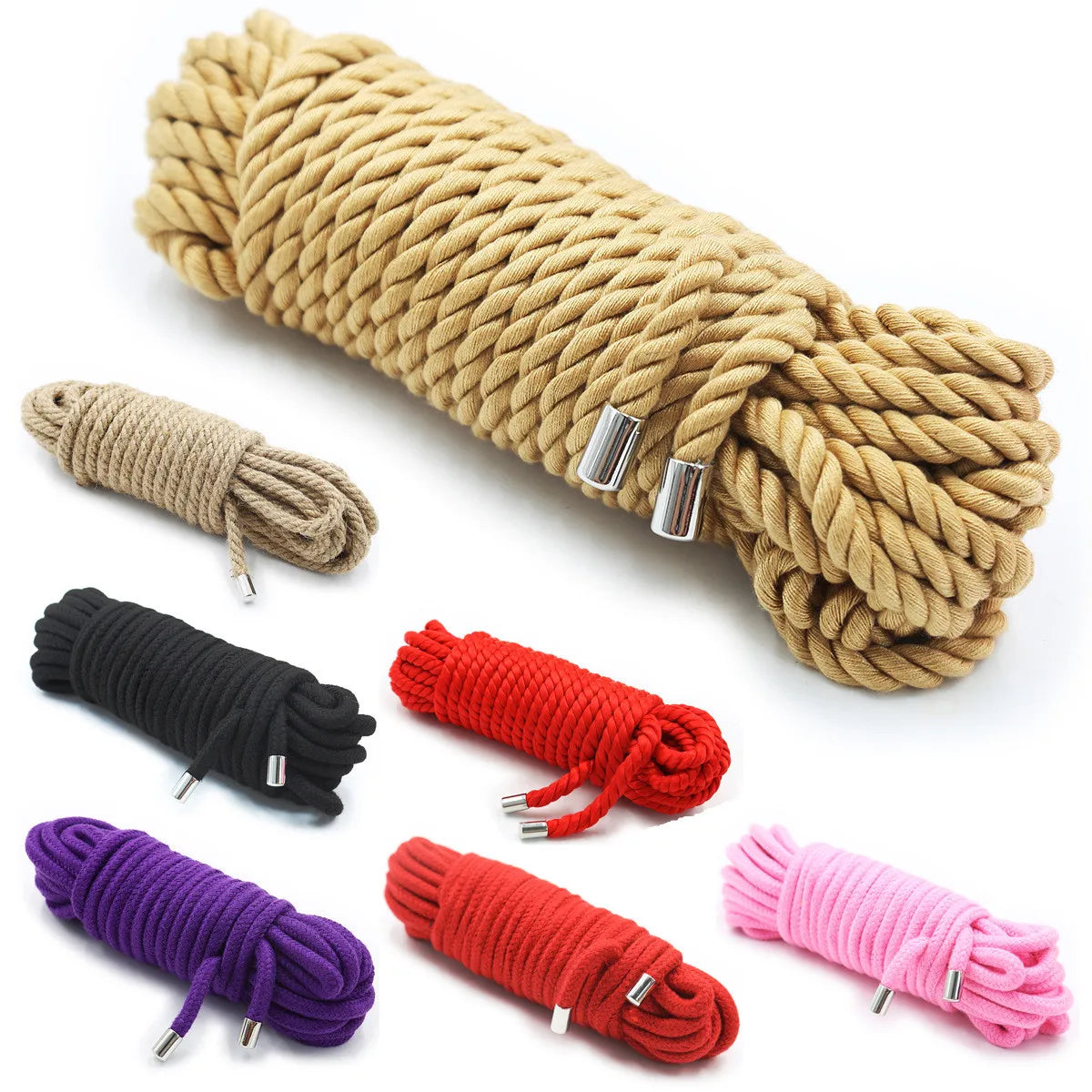 A collection of various colored Shibari bondage ropes including tan, black, red, purple, and pink.