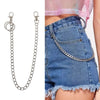 A close-up of a 16-inch chrome steel punk chain belt accessory with a keyring worn on a denim skirt.