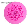 Pink silicone mold shaped like a lotus flower for cake decorating