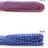 A collection of multi-colored paracord ropes in various colors including olive green, black, red, blue, and teal.