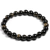 A stretch bracelet made of natural black gold obsidian gemstones.