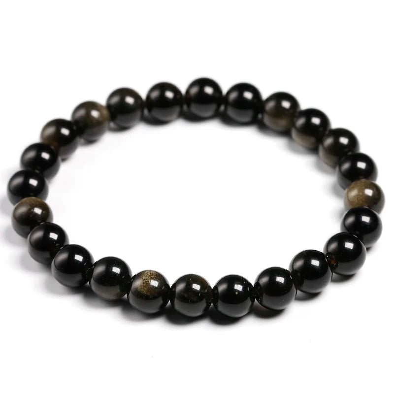 A stretch bracelet made of natural black gold obsidian gemstones.