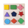A wooden puzzle board with colorful geometric shapes including squares, triangles, stars, and circles.